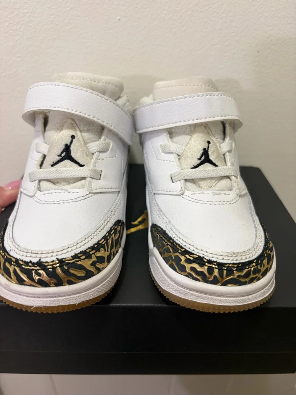 Jordan Kids White Sneakers with Black and Gold Accents